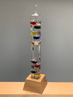 20" Tall Square Tube Galileo Thermometer With Wooden Base