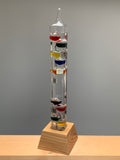 20" Tall Square Tube Galileo Thermometer With Wooden Base