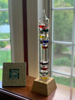 20" Tall Square Tube Galileo Thermometer With Wooden Base